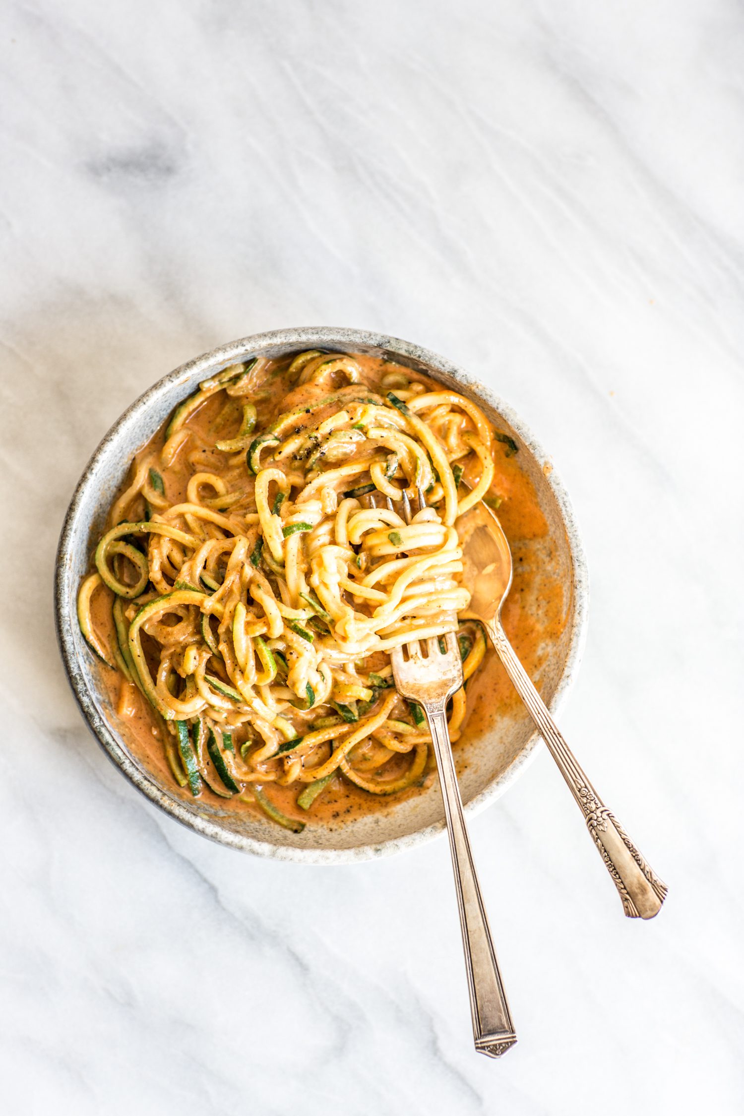 zucchini with red pepper sauce